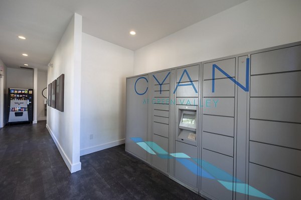 Secure parcel locker system at Cyan at Green Valley Apartments, ideal for convenient package storage and retrieval