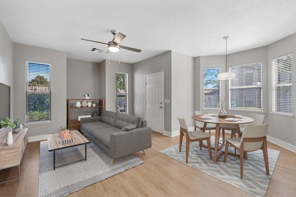 Modern kitchen with stainless steel appliances in Cyan at Green Valley Apartments