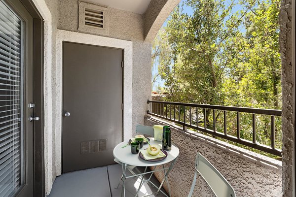 Patio with modern outdoor seating at Cyan at Green Valley Apartments
