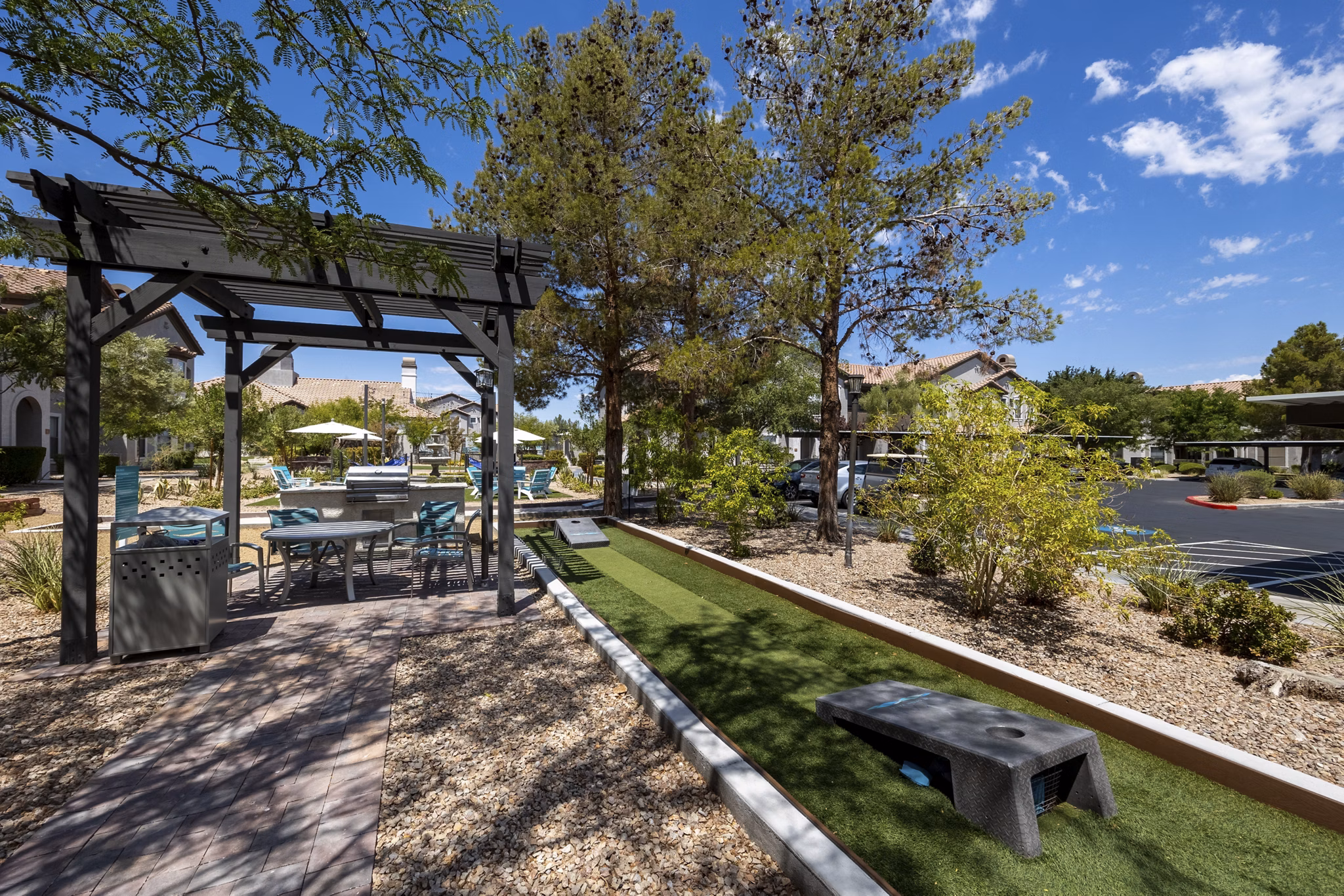 Relaxing courtyard with landscaped gardens at Milano Apartments