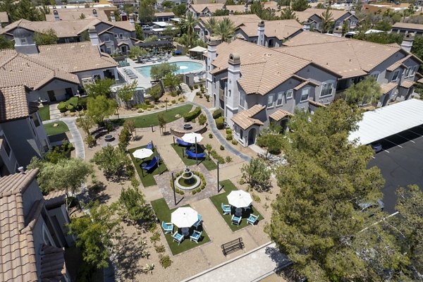 Cyan at Green Valley Apartments: Scenic view of luxury apartments surrounded by lush greenery