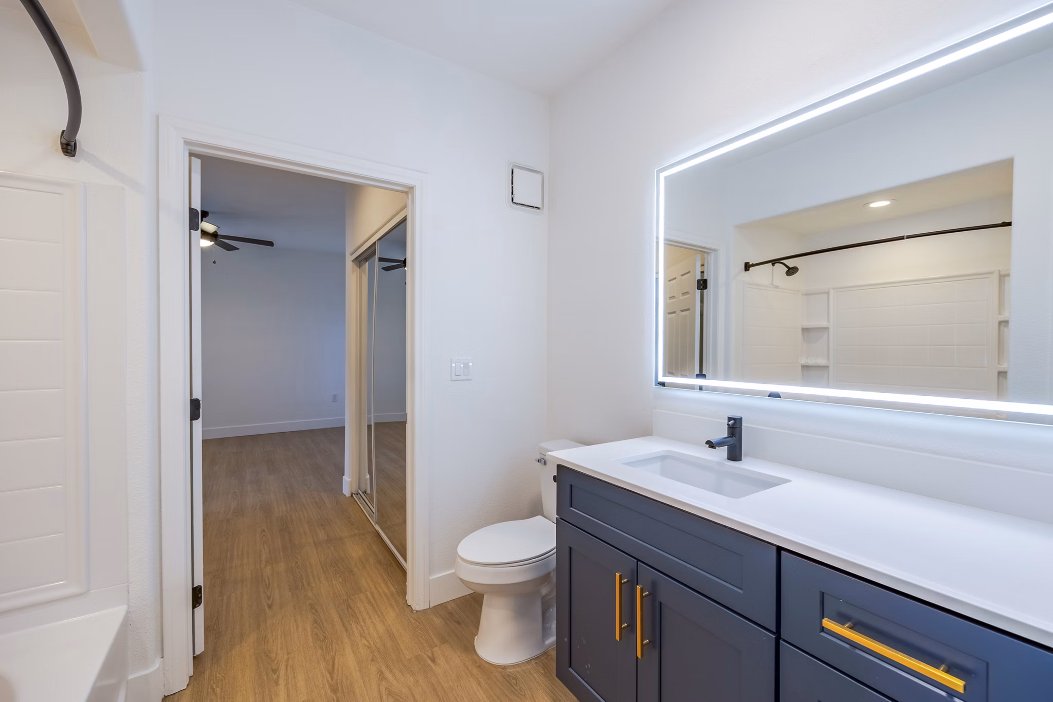Elegant bathroom with modern fixtures at The Presley at Whitney Ranch Apartments, a luxurious community by Greystar