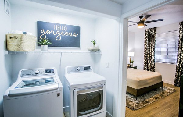 The Presley at Whitney Ranch: Modern laundry room with energy-efficient appliances