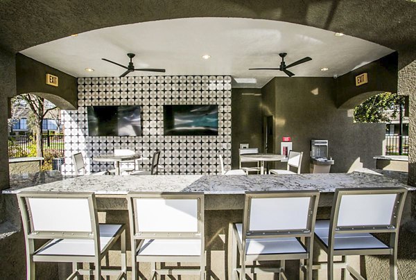 Patio with modern seating at The Presley at Whitney Ranch Apartments, perfect for outdoor relaxation and gatherings