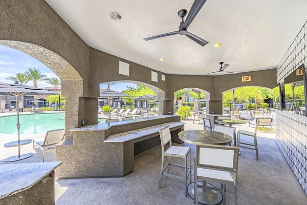 Patio view with cozy seating arrangements at The Presley at Whitney Ranch Apartments, ideal for outdoor relaxation and gatherings