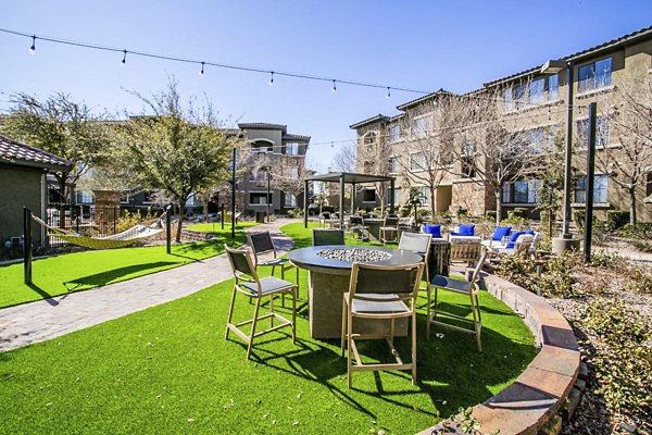 Cozy fire pit on relaxing patio at The Presley at Whitney Ranch Apartments