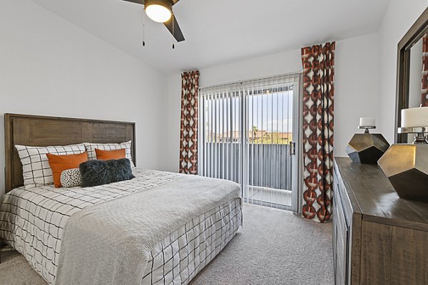 Cozy bedroom with modern decor at Townhomes at Horizon Ridge Apartments