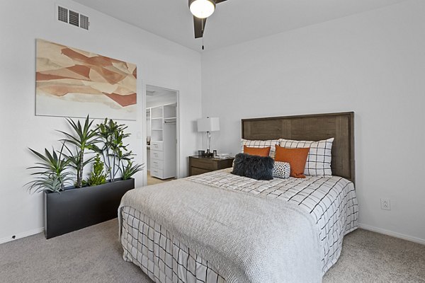 Cozy bedroom with elegant decor at Townhomes at Horizon Ridge Apartments