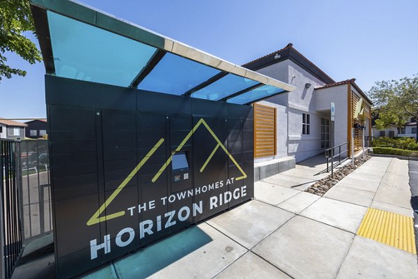 Parcel locker at Townhomes at Horizon Ridge Apartments: Secure package pickup amenity