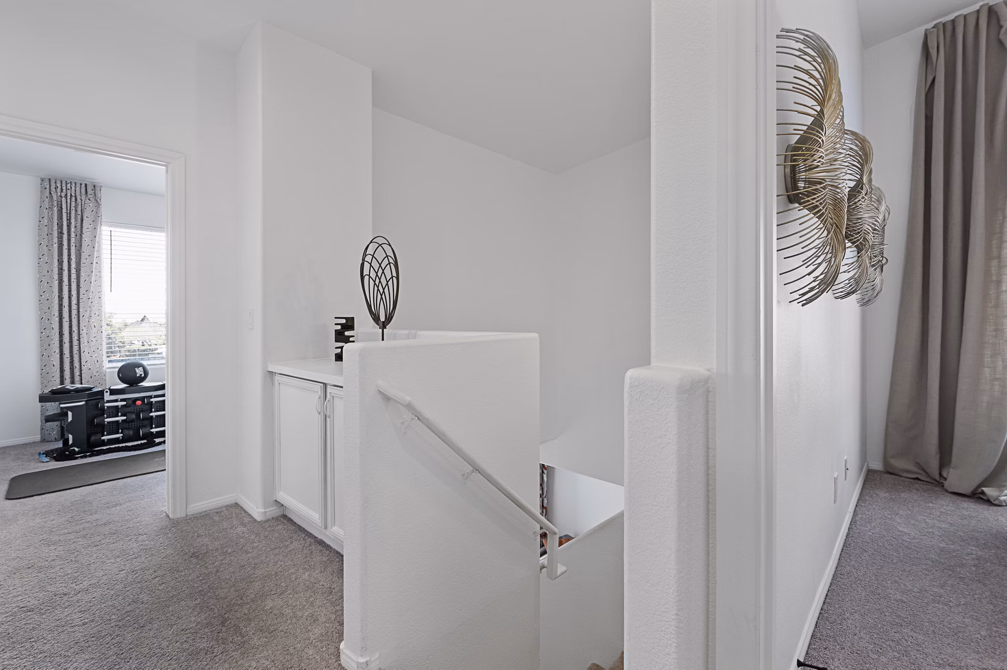 Modern kitchen with stainless steel appliances in Townhomes at Horizon Ridge Apartments