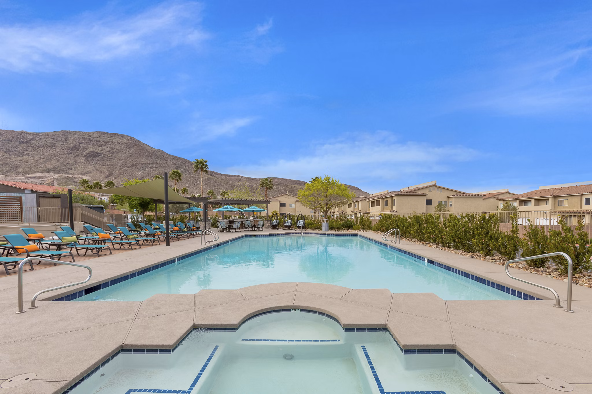 Rooftop pool with mountain views at Townhomes at Horizon Ridge Apartments