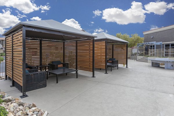 Townhomes at Horizon Ridge: Cozy patio with seating area, perfect for relaxation at luxury apartments in Las Vegas