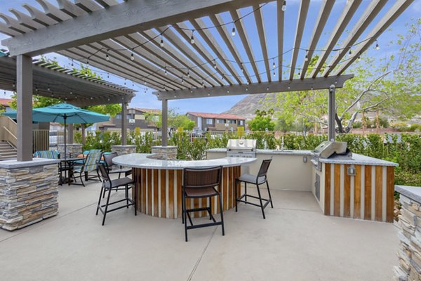 Grill area at Townhomes at Horizon Ridge featuring outdoor seating and BBQ stations