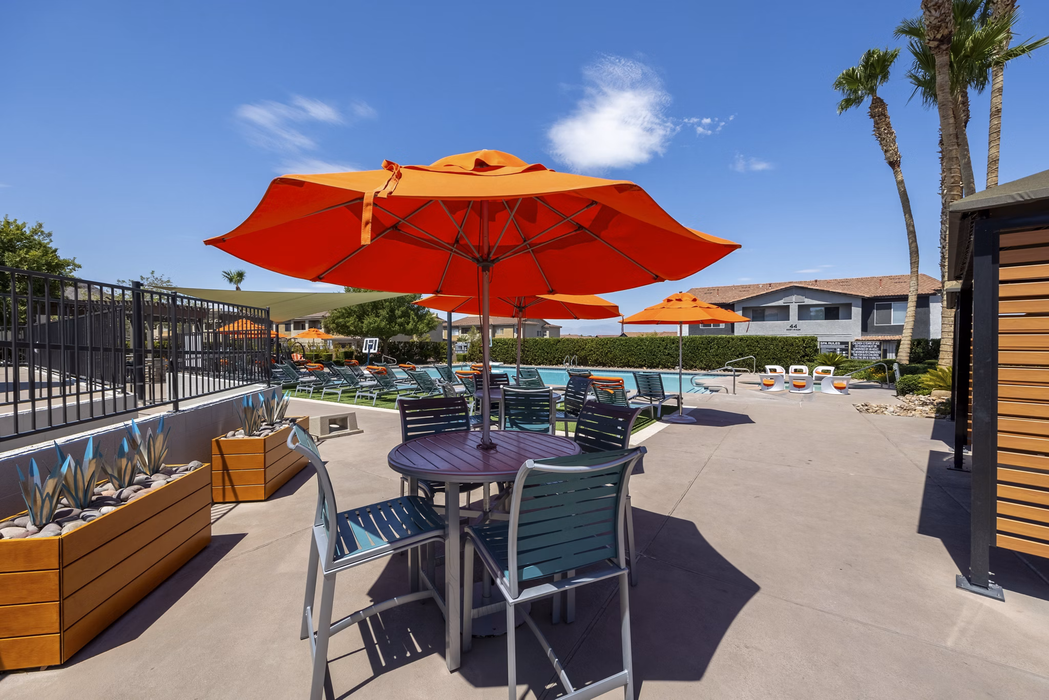 Scenic outdoor patio with modern seating at Townhomes at Horizon Ridge Apartments