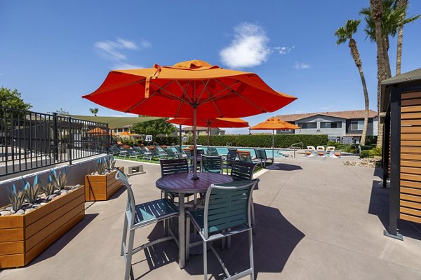 Scenic outdoor patio with modern seating at Townhomes at Horizon Ridge Apartments