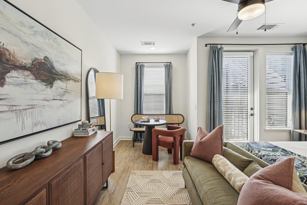 Spacious bedroom featuring modern decor at The Navigator Apartments with luxury amenities