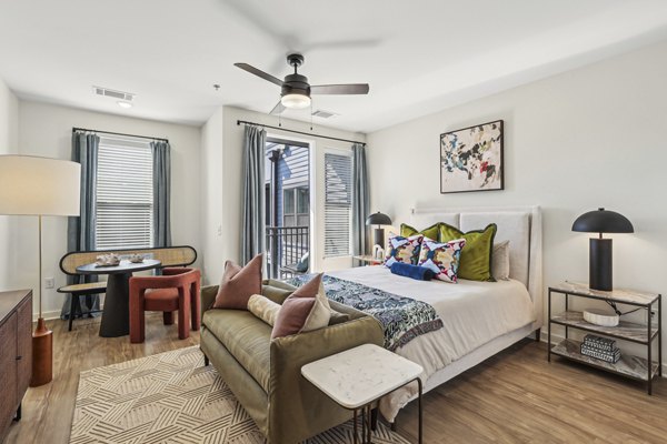 Modern bedroom with elegant furnishings at The Navigator Apartments