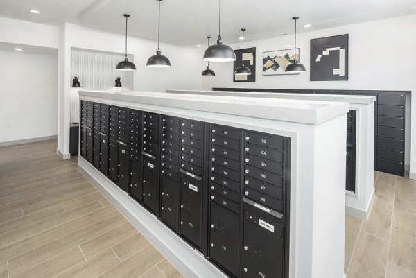 Modern mail room with secure package lockers at Prose Columbus Apartments