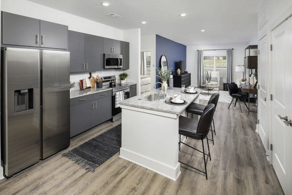 Modern kitchen with stainless steel appliances at Prose Columbus Apartments featuring luxury interiors for upscale living