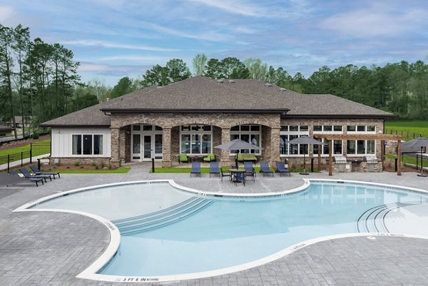 Rooftop pool with lounge seating at Prose Columbus Apartments
