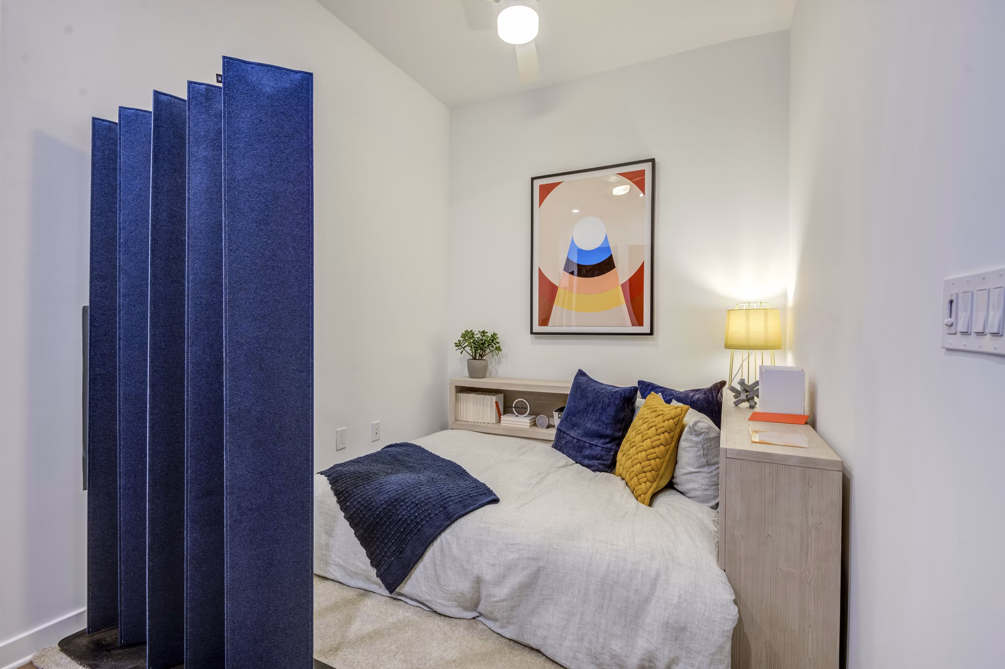bedroom at The District Apartments