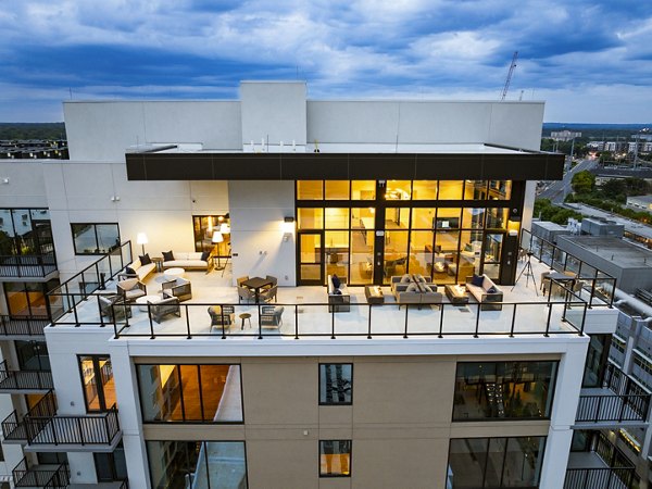 Private balcony with modern seating at The Grace Residences, luxury apartments