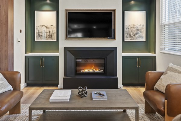 Clubhouse featuring modern design and cozy seating areas at Haven at Deer Creek Apartments