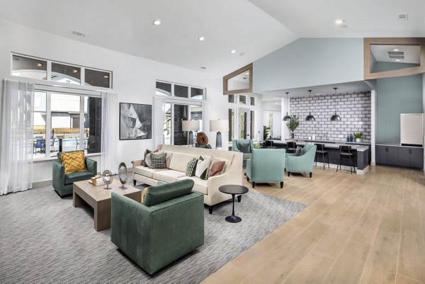 Clubhouse featuring stylish seating and vibrant decor at Prose LaGrange Apartments