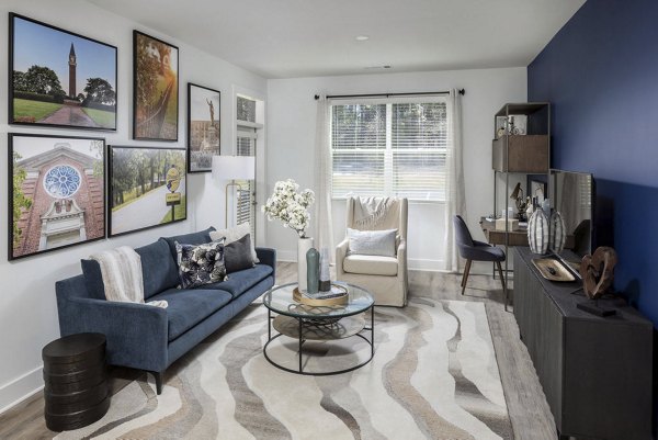 Cozy living room with modern furnishings at Prose LaGrange Apartments, offering luxury lifestyle and comfort in a serene setting