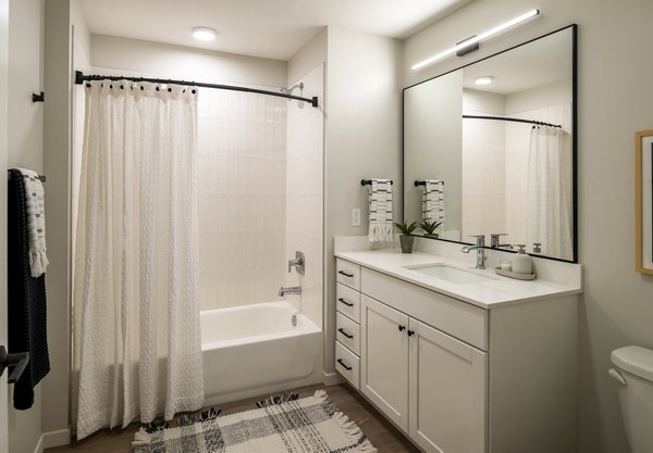 Bathroom featuring sleek modern fixtures at Vyne on Haven Apartments