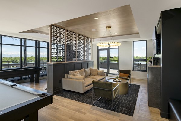 Clubhouse featuring modern decor and comfortable seating at Vyne on Haven Apartments