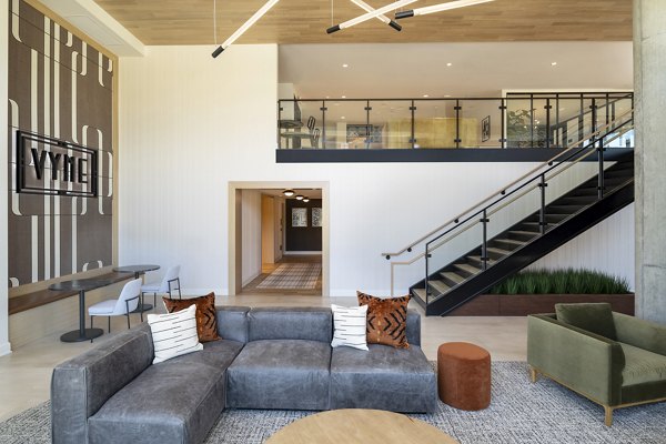 Upscale clubhouse featuring modern design at Vyne on Haven Apartments