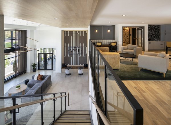 Clubhouse with modern design and comfortable seating at Vyne on Haven Apartments, a luxurious community in a serene setting