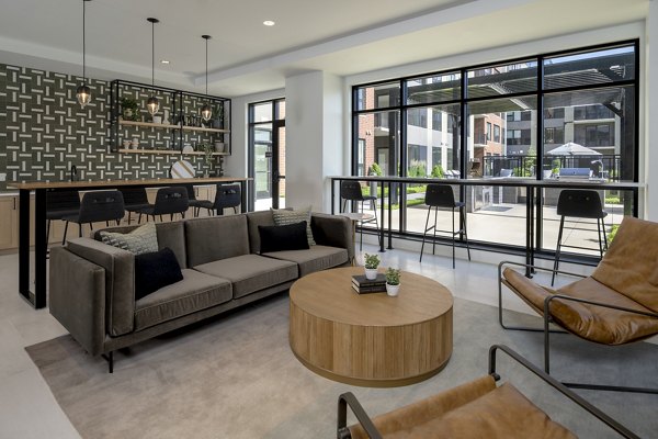 Clubhouse with modern seating and design at Vyne on Haven Apartments