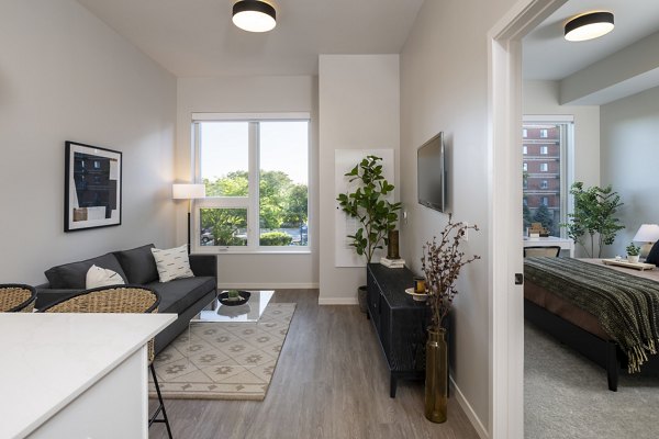 Spacious living room with contemporary design at Vyne on Haven Apartments