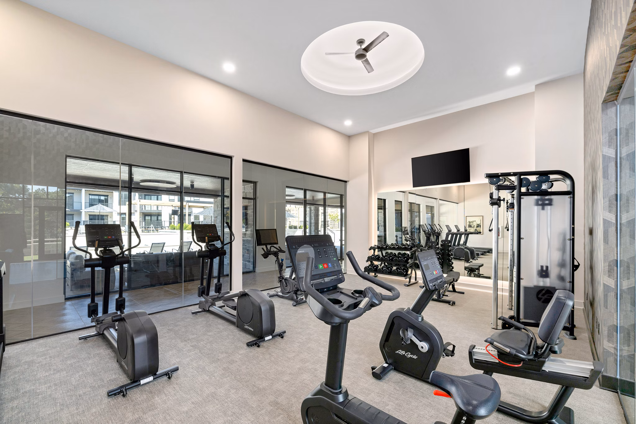 fitness center at The Fieldston of Fairway Apartments