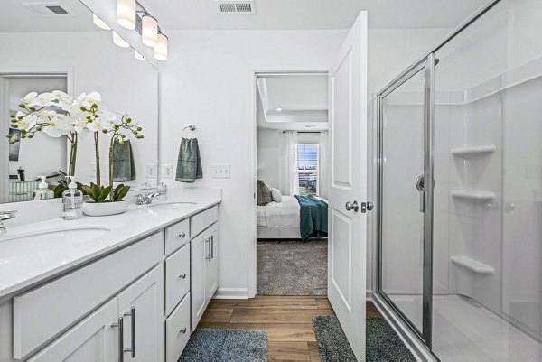 Luxurious bathroom with marble finishes at Wayford at Pringle Towns Apartments
