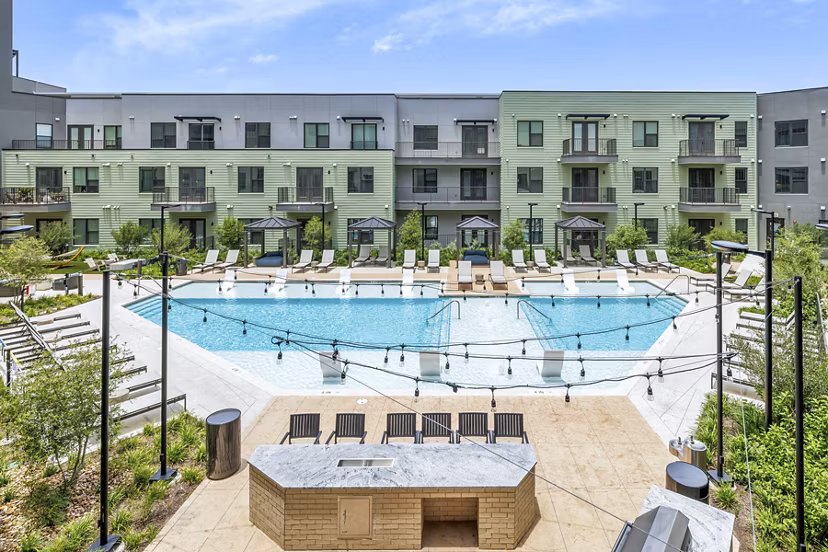 grill area/pool at Rivette Tower Apartments