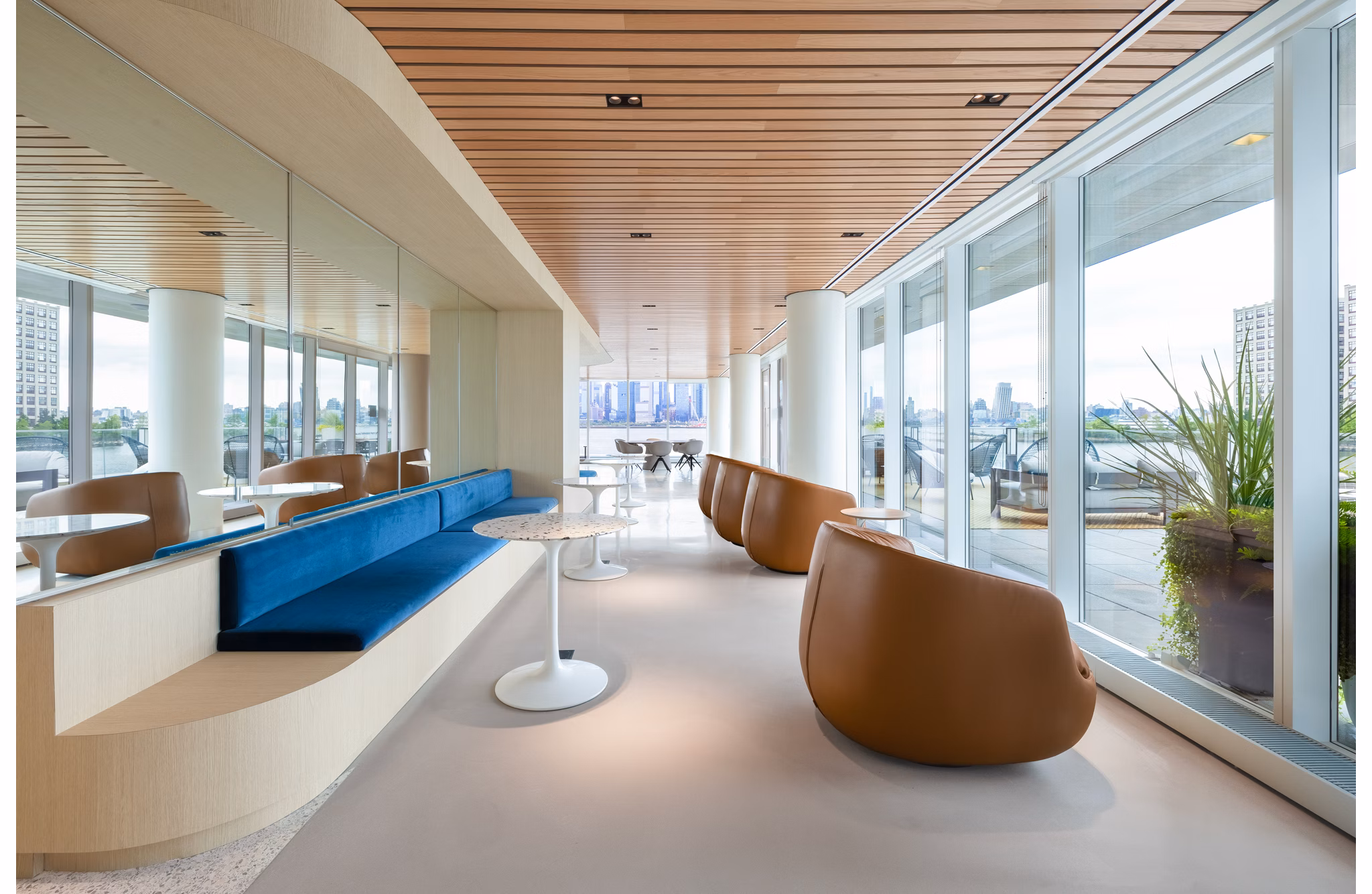 Modern clubhouse featuring luxury amenities at Hoboken Point Apartments, ideal for social gatherings and relaxation