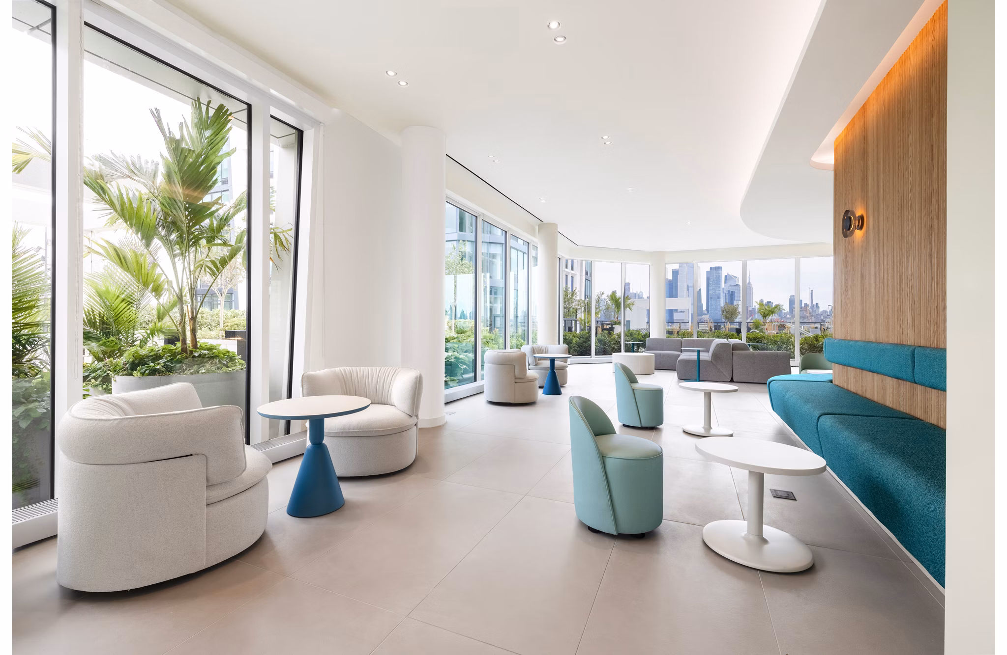 Clubhouse at Hoboken Point Apartments: Modern design with communal seating and entertainment areas for social gatherings and relaxation