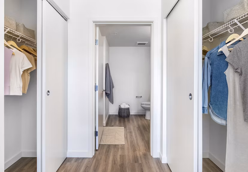 Organized closet with built-in shelving and ample storage at Broadstone Savoie Apartments