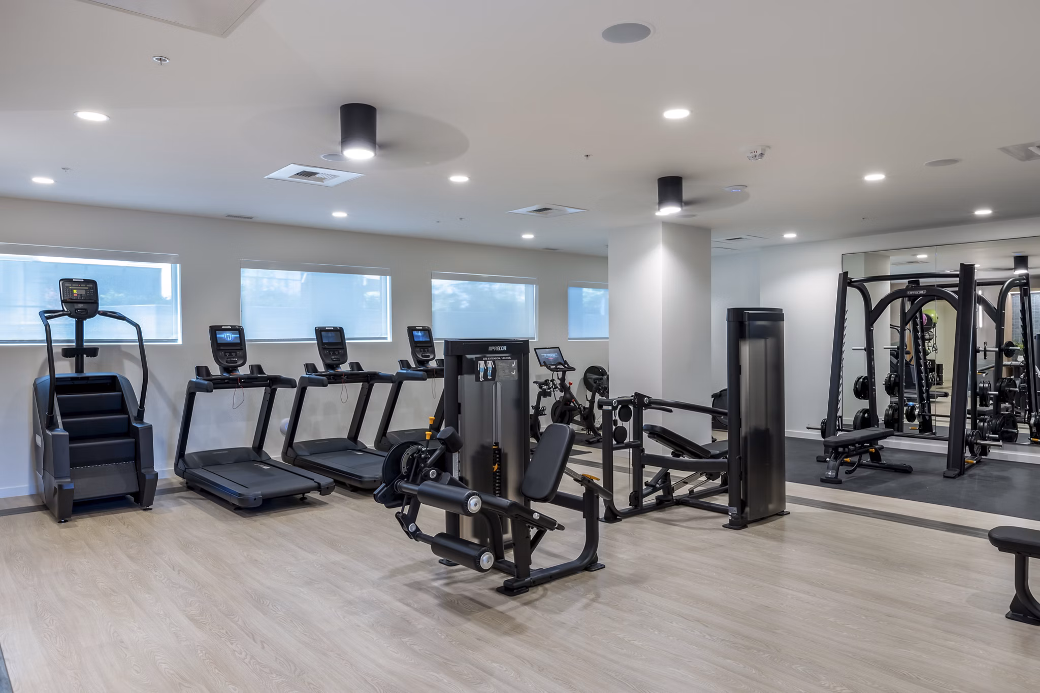 State-of-the-art fitness center with modern equipment at Broadstone Savoie Apartments