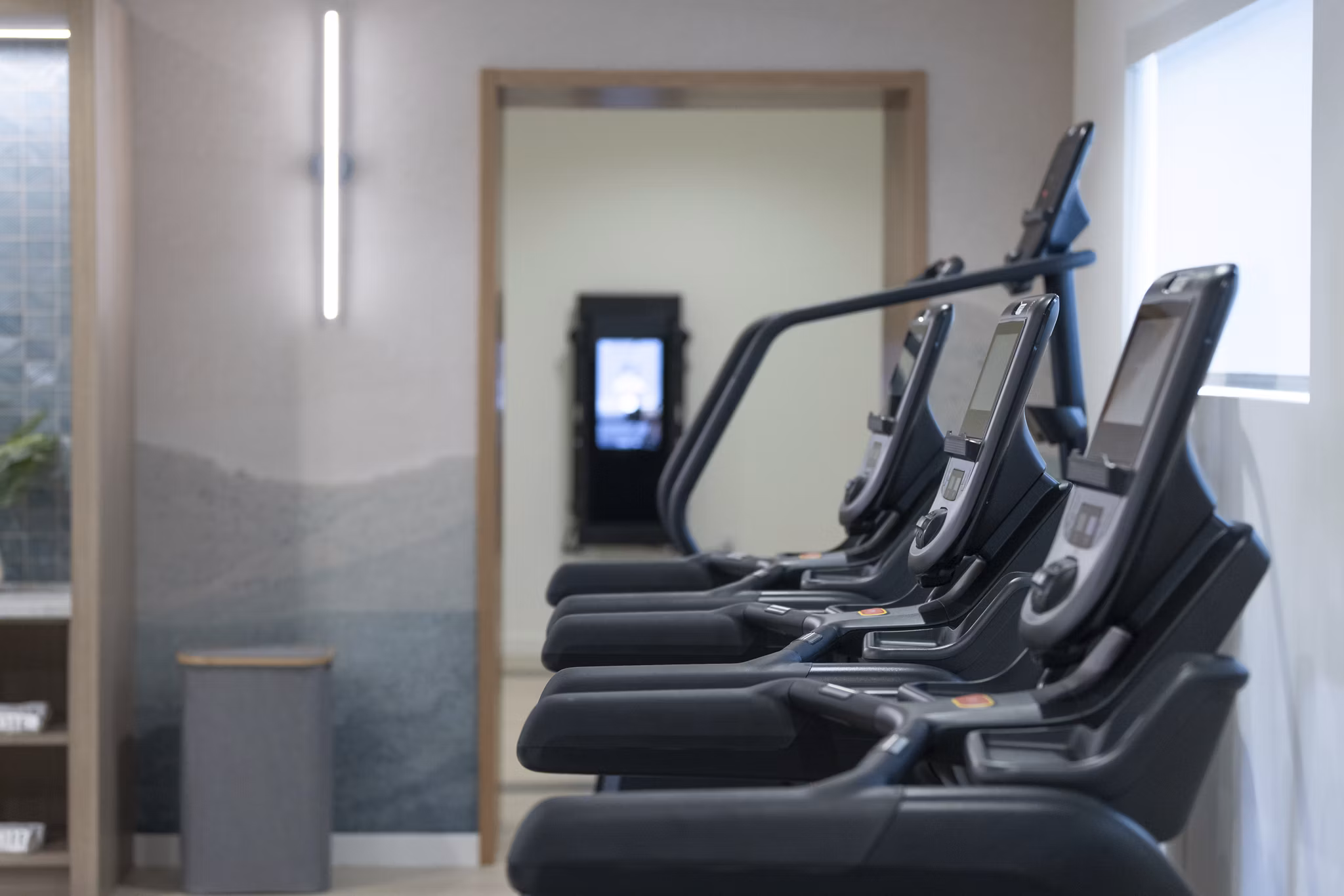 State-of-the-art fitness center with modern equipment at Broadstone Savoie Apartments, perfect for active lifestyles and wellness-focused residents