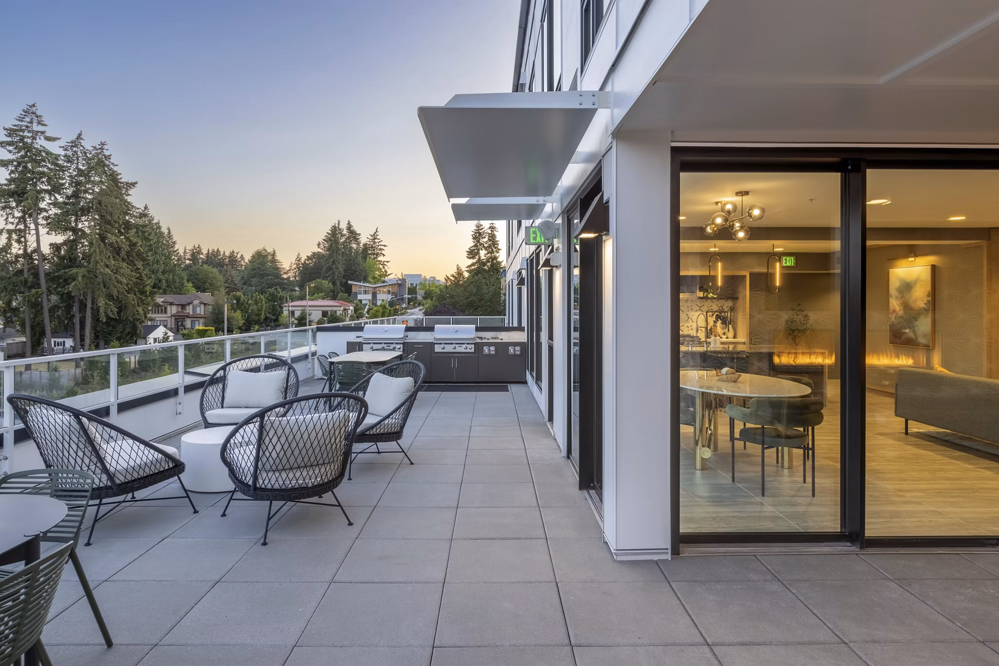 Cozy patio with modern furniture at Broadstone Savoie Apartments