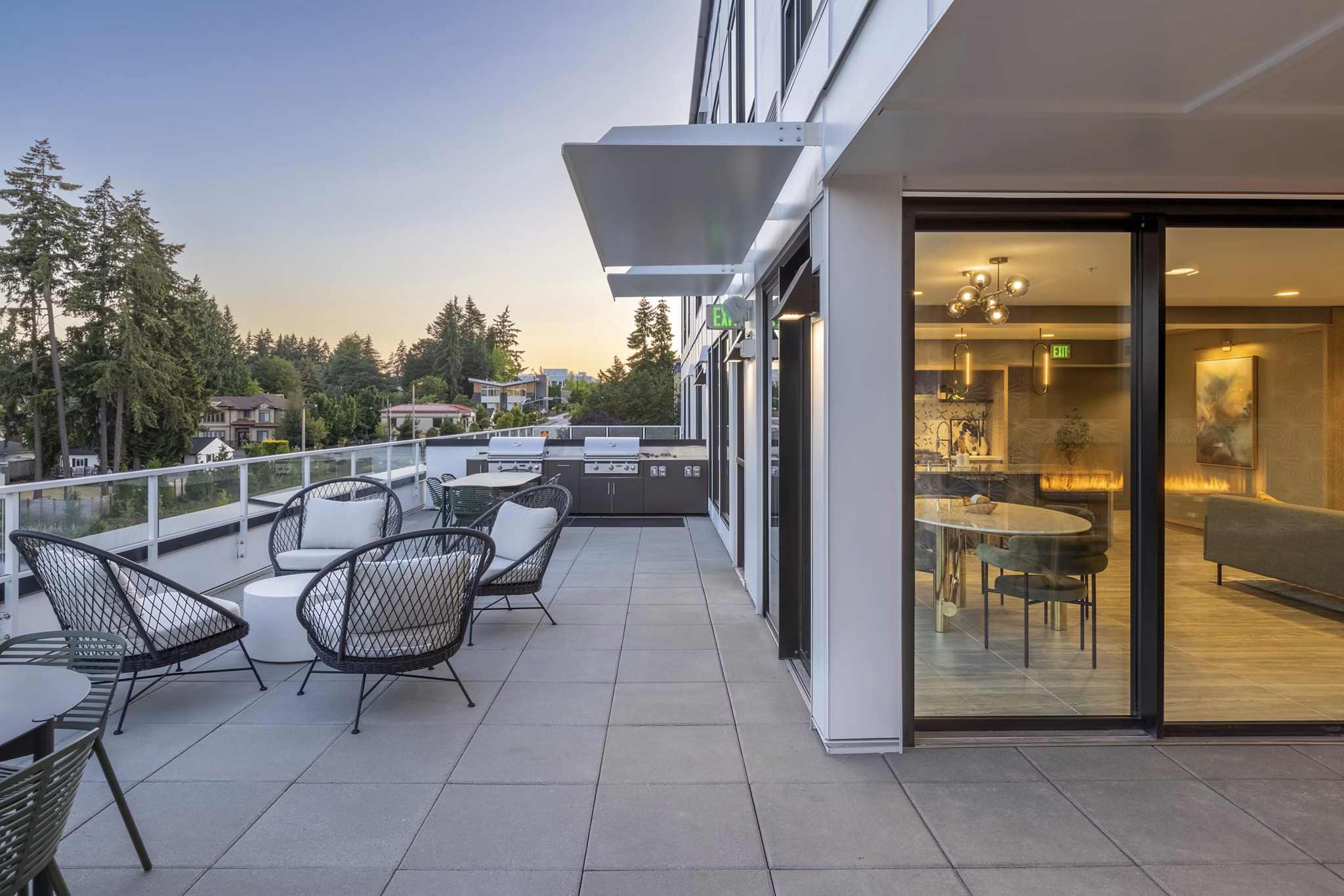 Cozy patio with modern furniture at Broadstone Savoie Apartments