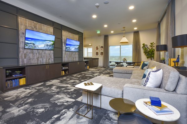 Clubhouse at Alta Washington: modern design featuring comfortable seating and vibrant decor