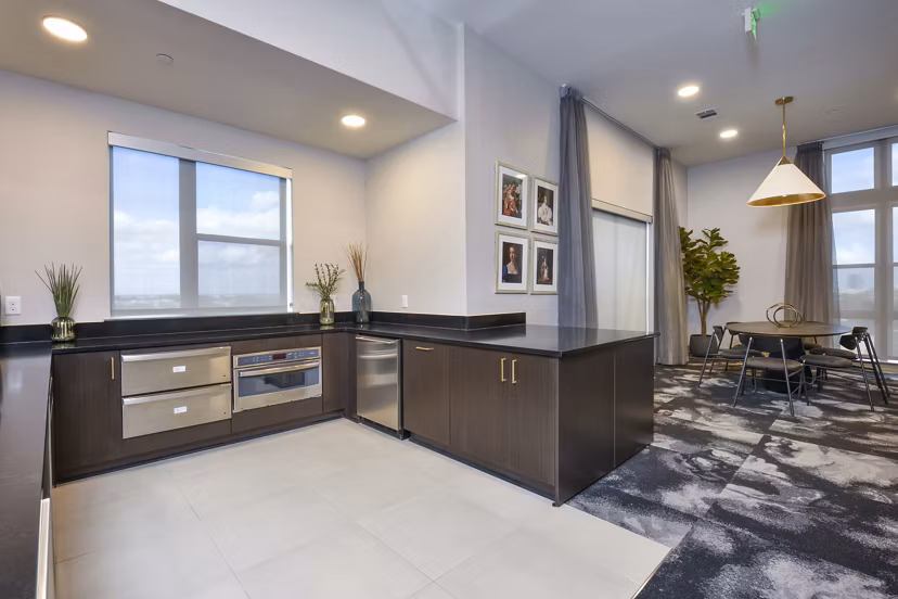 Clubhouse with modern design and cozy seating at Alta Washington Apartments, a luxury Greystar community in the heart of vibrant city life