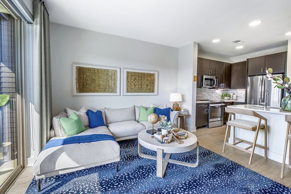 Spacious living room with modern furnishings at Alta Washington Apartments