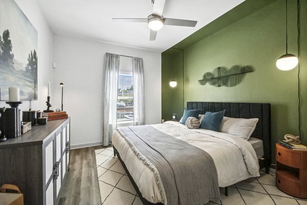 Cozy bedroom with elegant design at Advenir at Mallory Lake Apartments