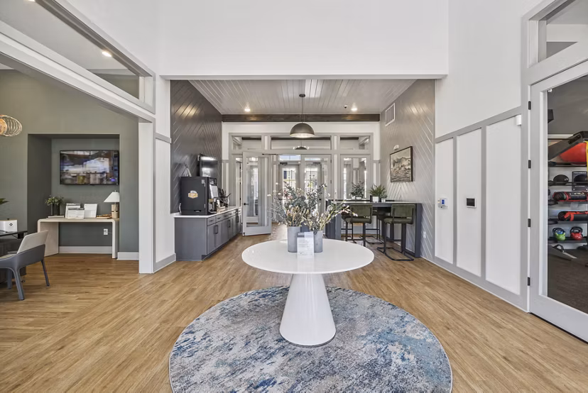 Modern clubhouse with cozy seating and elegant decor at Advenir at Mallory Lake Apartments